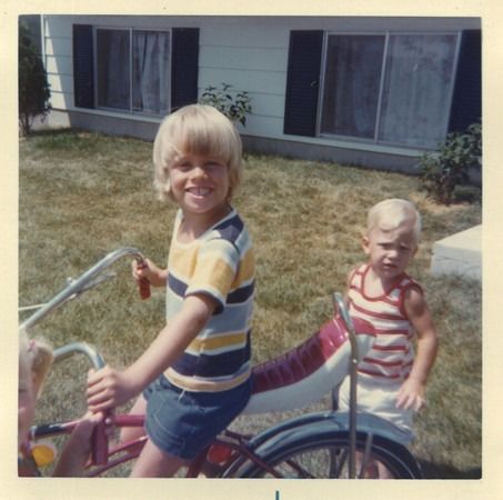 me on a bike as a kid